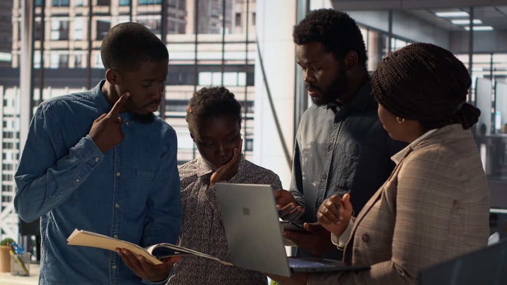 multinational company workers meet to plan a project focused on growth